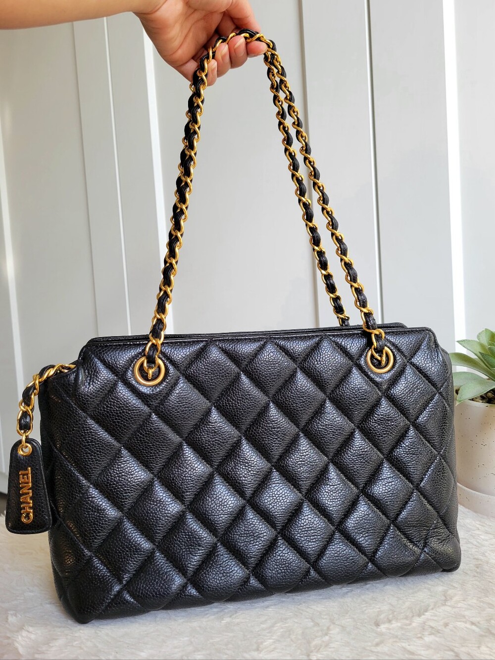 CHANEL Black Quilted Leather Tote with Gold Chain Handles